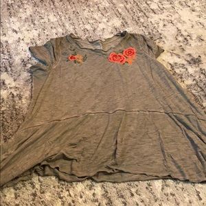 Green floral shark bite top